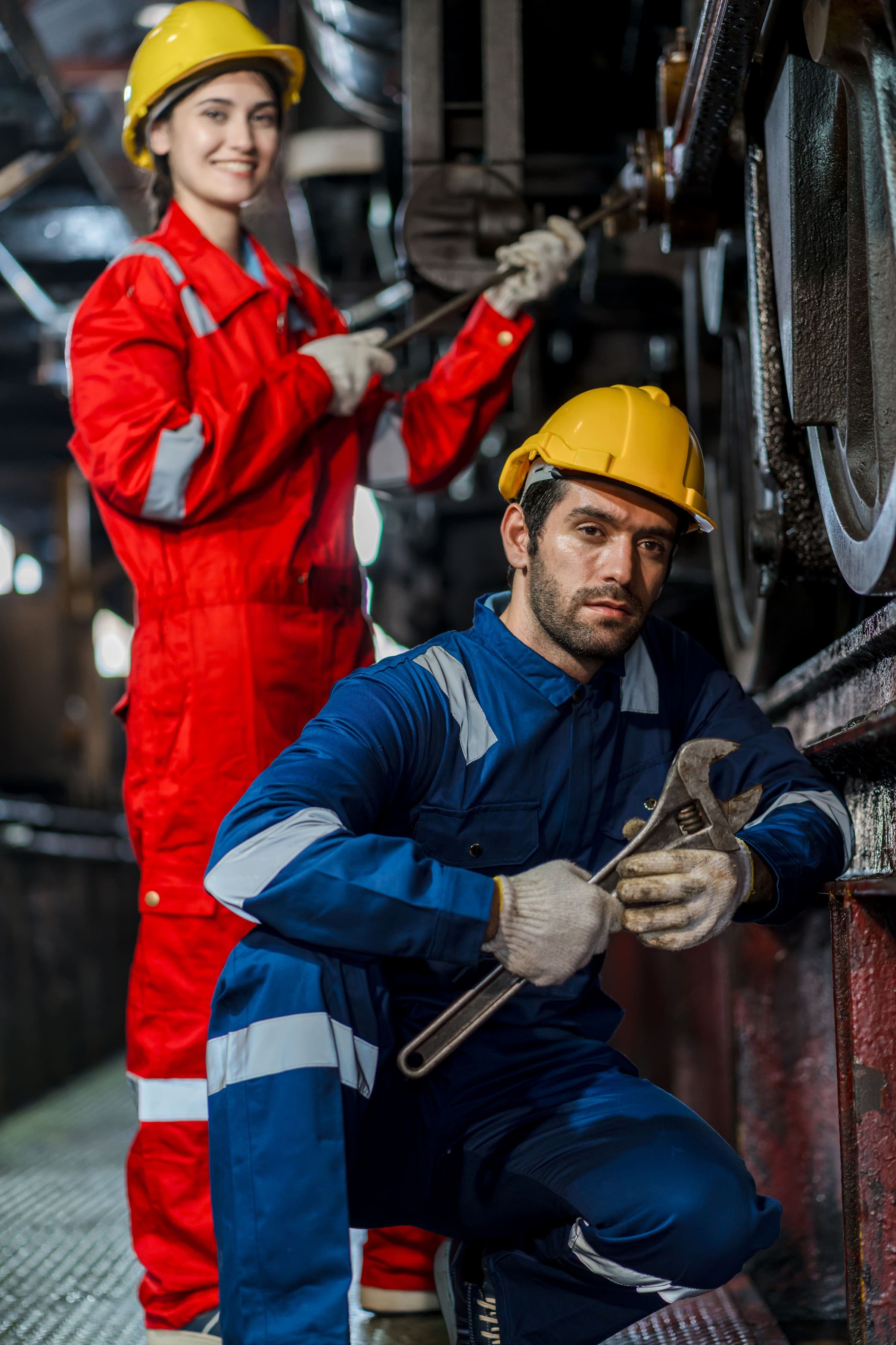 Engineers working on equipment at an industrial site